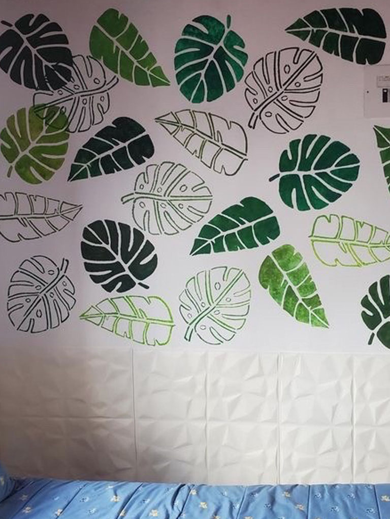 Mural de Gloria con la colección Monstera